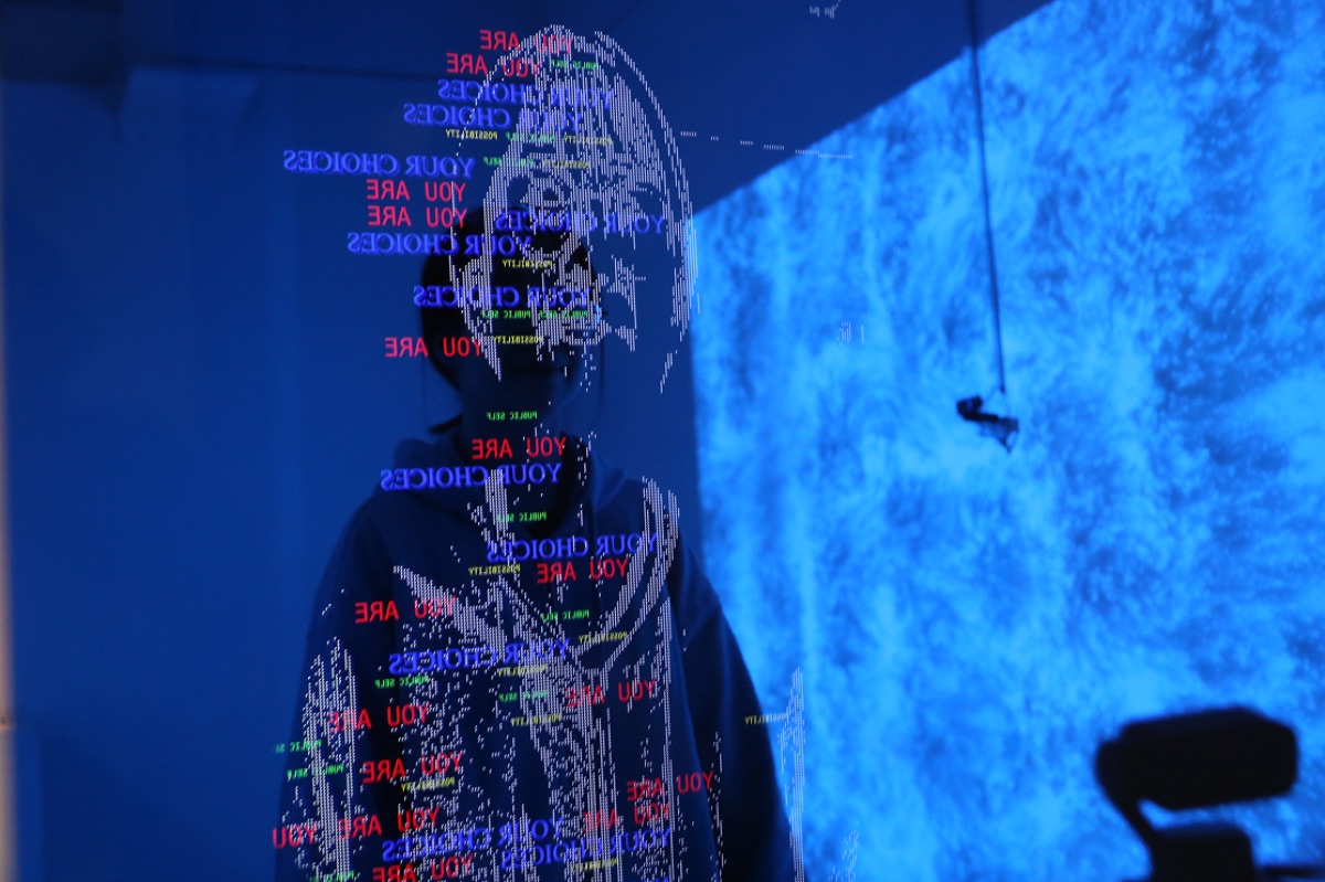 Blue projection with text patterns