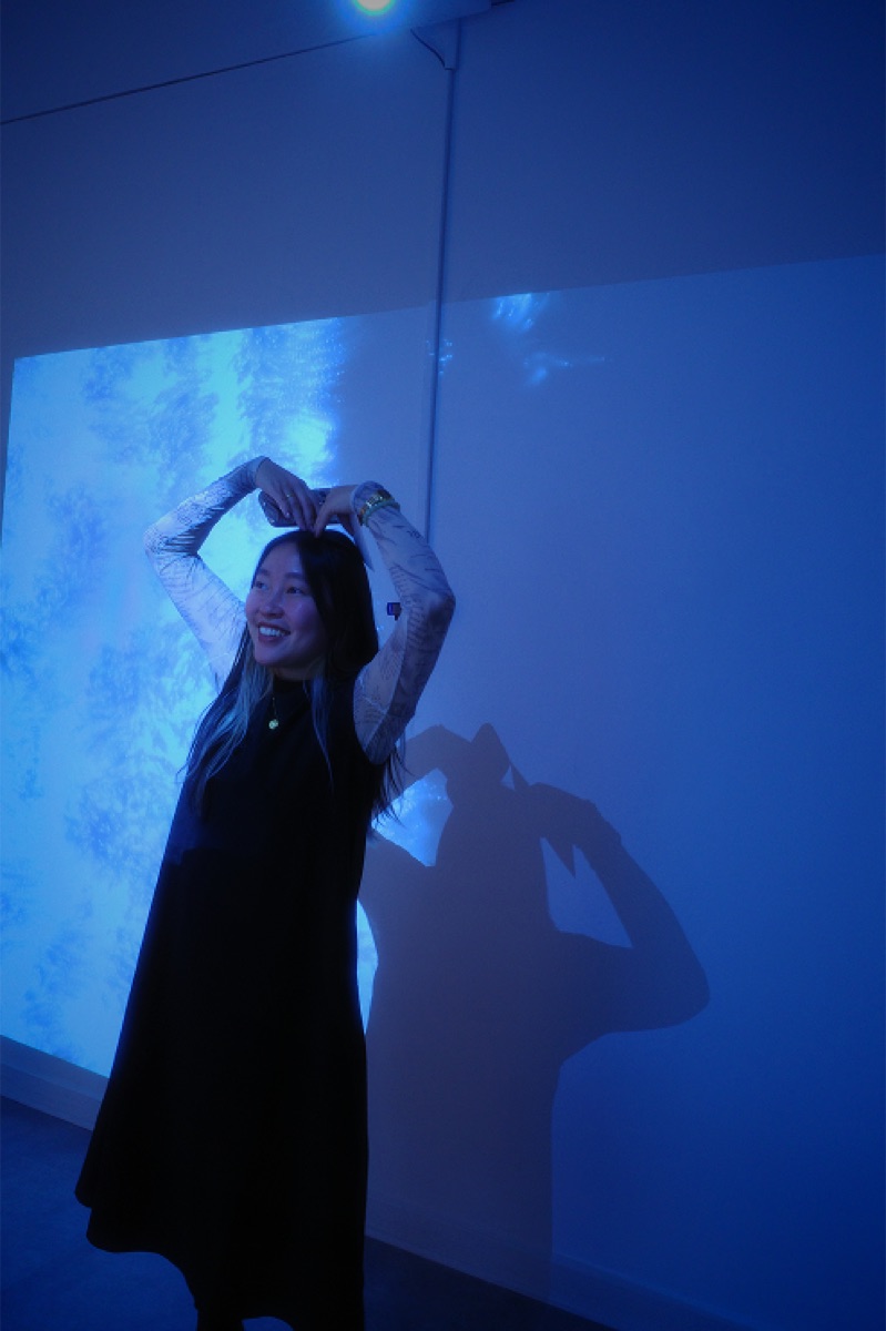 Blue ambient projection portrait